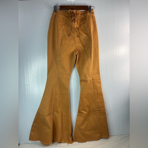 Free People 28 Curvy Lace Back Raw Hem Super Bell Bottom Jeans in Harvest Gold - Picture 2 of 10